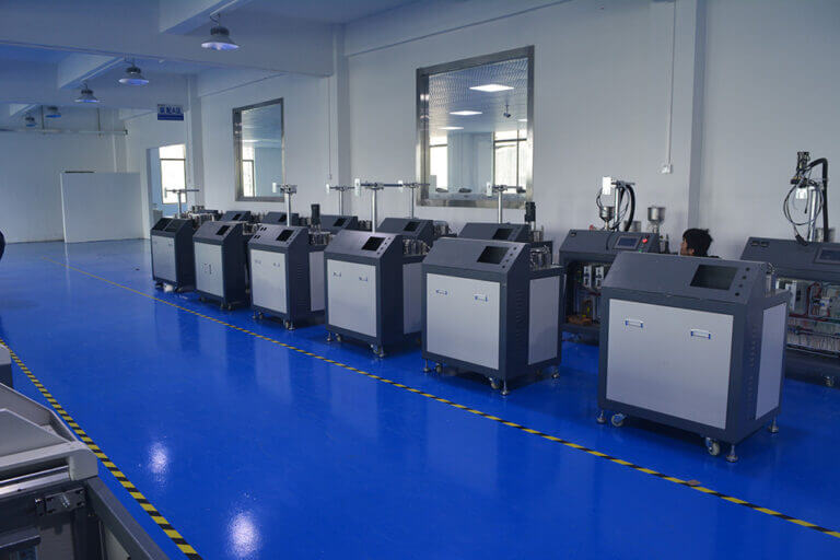 Completed resin dispensing machines arranged for inspection