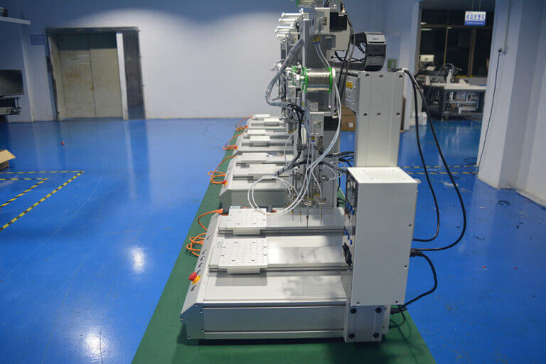 Rows of resin dispensing machines prepared for production testing