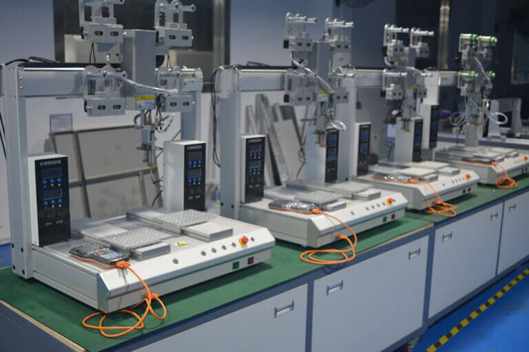 Resin dispensing machine workstations in the manufacturing facility