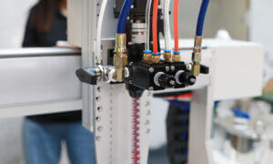 Dynamic mixing system for epoxy and polyurethane doming resin