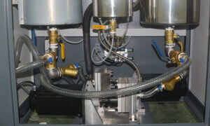 Precision gear pump for resin doming machine dispensing