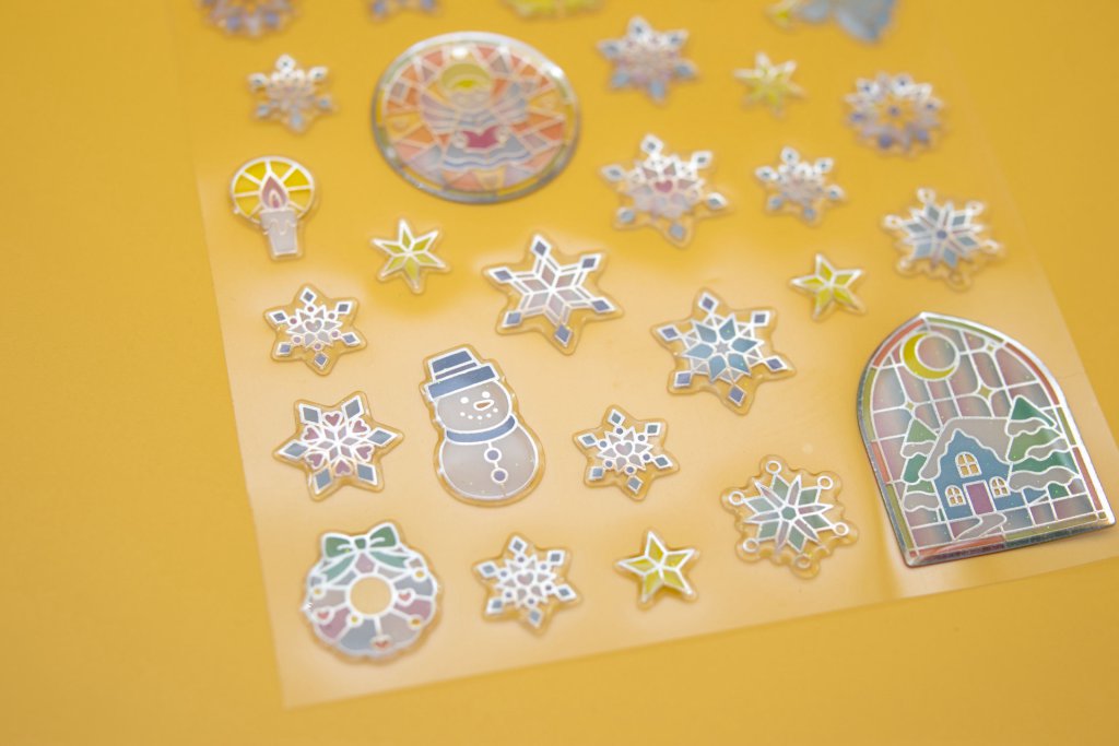 Intricate snowflake and ornamental domed sticker samples