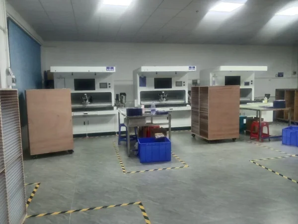 Automatic doming machines and curing racks in a production area