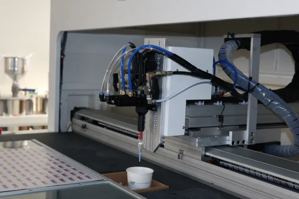 SJ4060 CCD vision dispensing head positioned over a sample sheet