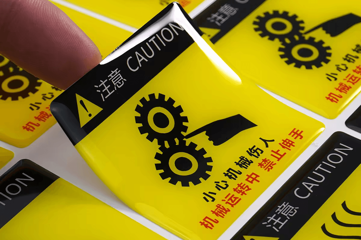 Domed industrial label sample with raised resin finish
