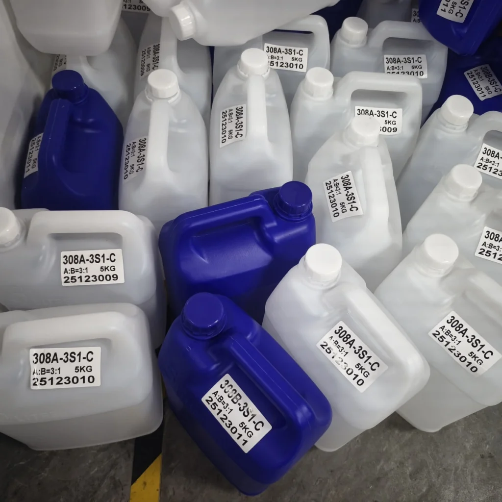 Resin Doming Production Line Setup Checklist Labeled A and B resin component containers for doming production