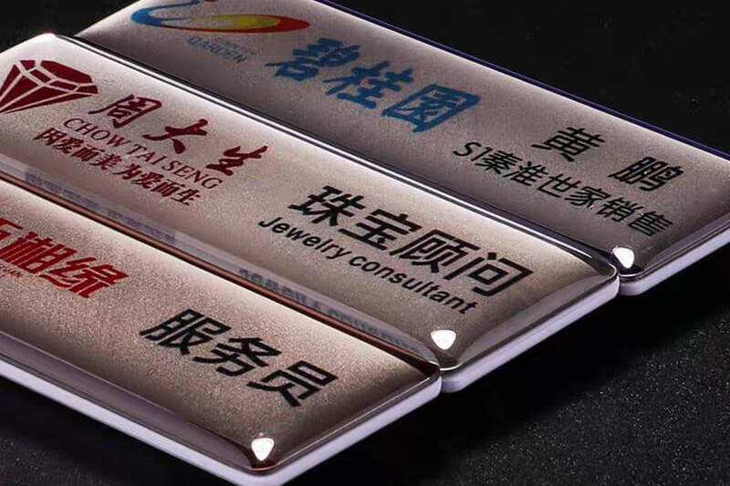 Domed nameplate sample with raised resin finish